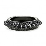 Plastic bangle adorned with rhinestones and cone studs.